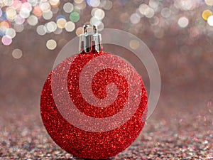 Christmas balls on a silvery background. Christmas decoration with beautiful bokeh.