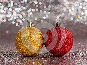 Christmas balls on a silvery background. Christmas decoration with beautiful bokeh.