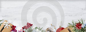 Christmas banner with gifts and decorations, copy space on the white background. Wide format, bottom border