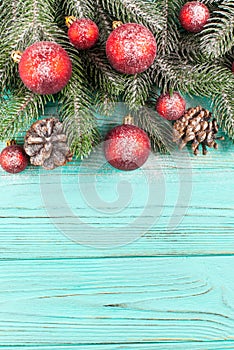 Christmas banner with green tree, red and white handmade felt decorations on white wooden textured background