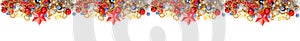 Christmas banner with green Xmas tree branch, winter holly berries, red baubles and gold stars isolated on white background