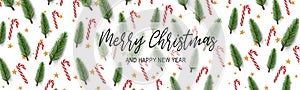 Christmas banner with realistic fir tree branches, red and white cane candy and golden stars. Horizontal Xmas header for a website