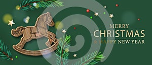 Christmas banner with realistic wooden rocking horse, decorative green tree pine, gold stars. Horizontal Christmas