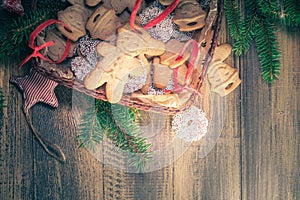 Christmas basket full dumplings Sweet cookies wooden table space