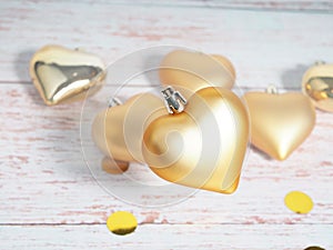 Christmas bauble. Christmas toy in the shape of a heart of gold color. Christmas. New year stock photo