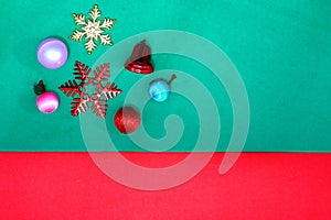 Christmas bauble, snowflake fruits and ring bell on Red green backgroundl,top view with copy space photo