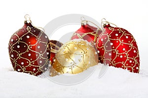 Christmas bauble on white snow background