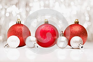 Christmas baubles with bokeh of party llights