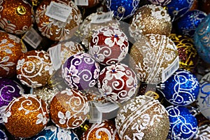 Christmas baubles decoration on bright background. lay in store. Holiday concept