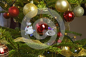 Christmas Baubles on a illuminated Christmas tree