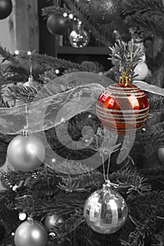 Christmas Baubles on a illuminated Christmas tree