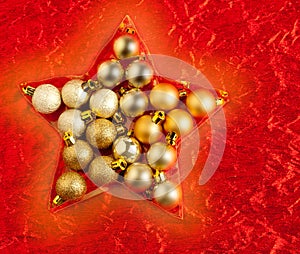 Christmas baubles in star shape on red