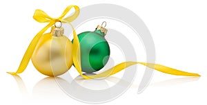 Christmas baubles yellow and green with ribbon bow isolated on white background