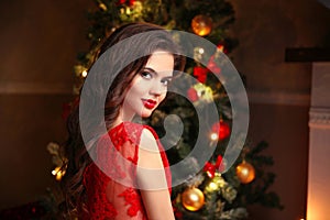 Christmas. Beautiful smiling woman portrait. Makeup. Healthy lon