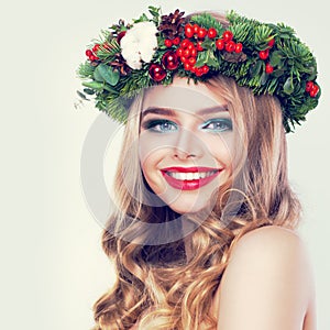 Christmas Beauty. Happy Model Woman with Blonde Permed Hairstyle photo