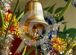 Christmas bell with glittered ornaments.