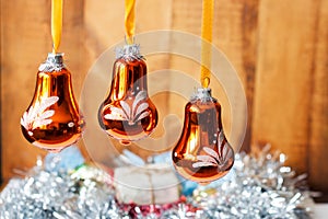 Christmas bells against defocused background .