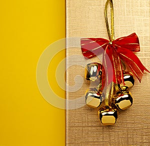 Christmas Bells On The Golden Background