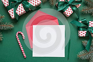 Christmas blank for letter to Santa on green. Invitation. Space for wishes. Top view