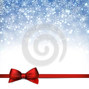 Christmas blue background with gift bow.