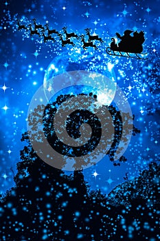 Christmas blue background. Silhouette of Santa Claus flying on a