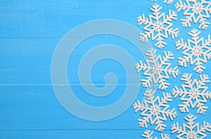 Christmas blue background with snowflakes