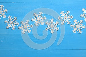 Christmas blue background with snowflakes