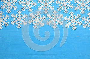 Christmas blue background with snowflakes