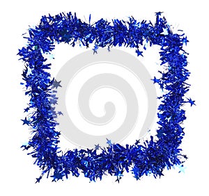 Christmas blue tinsel with stars as frame.