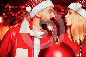 Christmas bomb. Creative boom. After Christmas shopping. Sexy couple in a Night Club. New Year fashion concept