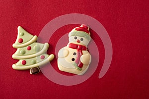 Christmas bonbons with chocolate christmas tree and snowman