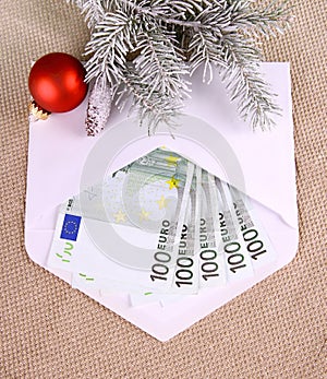 Christmas bonus - five hundred euro in envelope and decor