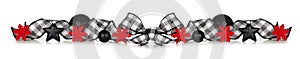 Christmas border of black and white checked buffalo plaid ribbon, ornaments and red snowflakes isolated on white