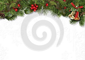 Christmas border branches and holly on white background