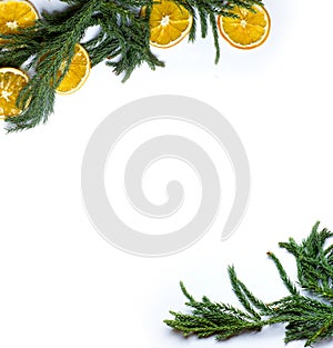 Christmas border frame of fir tree branch on white background isolated