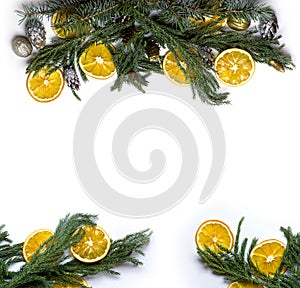 Christmas border frame of fir tree branch on white background isolated