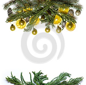 Christmas border frame of fir tree branch on white background isolated