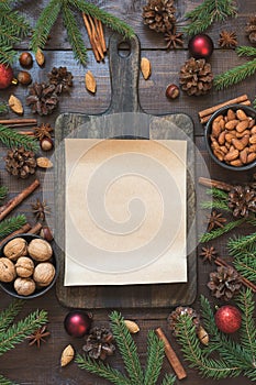 Christmas border with ingredient for cooking holiday food with copy space on cutting board.