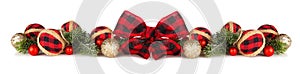 Christmas border of red and black check ribbon and ornaments isolated on white