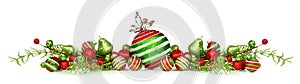 Christmas border of red, green and white ornaments and branches