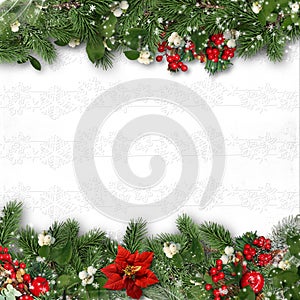 Christmas border on white background with holly,firtree,vÃÂ­scum. photo