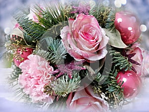 Christmas bouquet with pink roses and ornaments close-up stock photo images