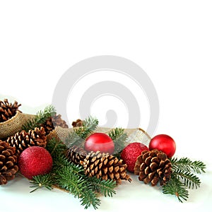 Christmas Bulb, Pine Cone, and Evergreen Border Isolated on Whit