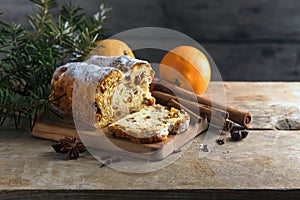 Christmas cake, in germany christstollen with fir branches, oran