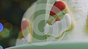 Christmas cake with gingerbread cookies in the shape of Santa Claus. Macro shooting