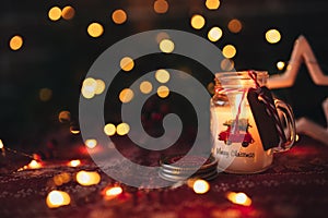 Christmas candle background, christmas lights bokeh, candle light