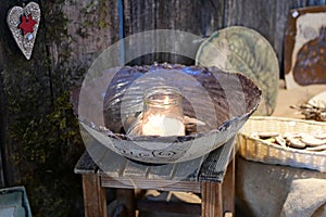 Christmas candle in a bowl