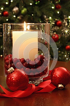 Christmas candle buring brightly photo