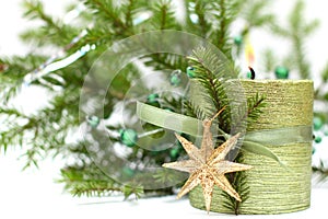 Christmas candle, decoration and green fir tree