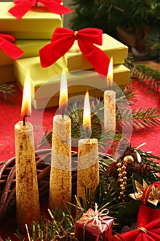 Christmas candle and gifts